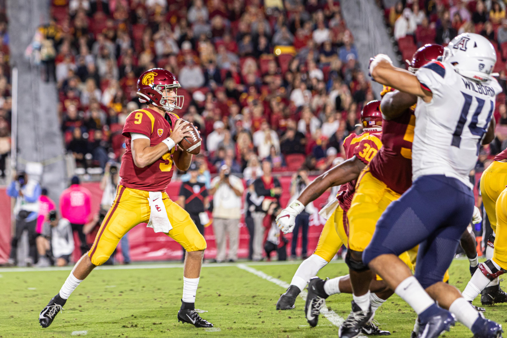 Sophomore quarterback Kedon Slovis drops back to throw a pass against Arizona in a game in fall 2019.
