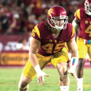 Cleveland Browns defensive lineman Porter Gustin lining up prior to a snap in a game for the USC Trojans.
