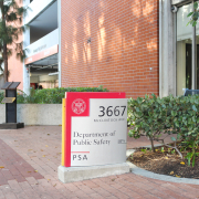 A photo of the DPS building. A sign says Department of Public Safety in front of a red brick building.