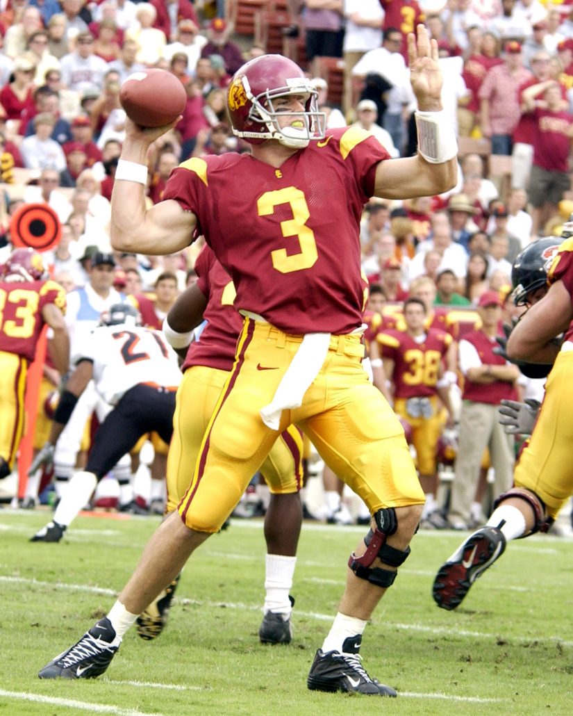 Carson Palmer throws a pass in a game for the Trojans.