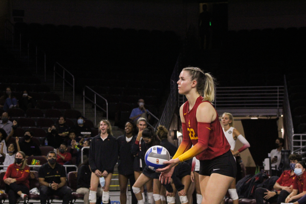 Graduate student outside hitter Shannon Scully prepares to serve.