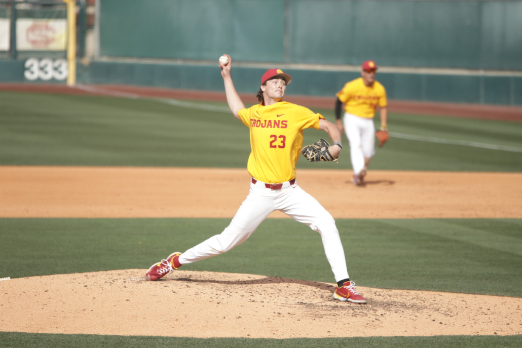 Sophomore pitcher Charlie Hurley in the middle of throwing a baseball during USC’s series against Santa Clara. 