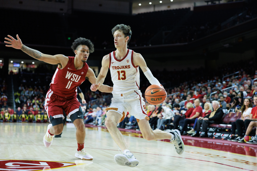 Senior guard Drew Peterson dribbles down the baseline during USC’s game against Washington State.