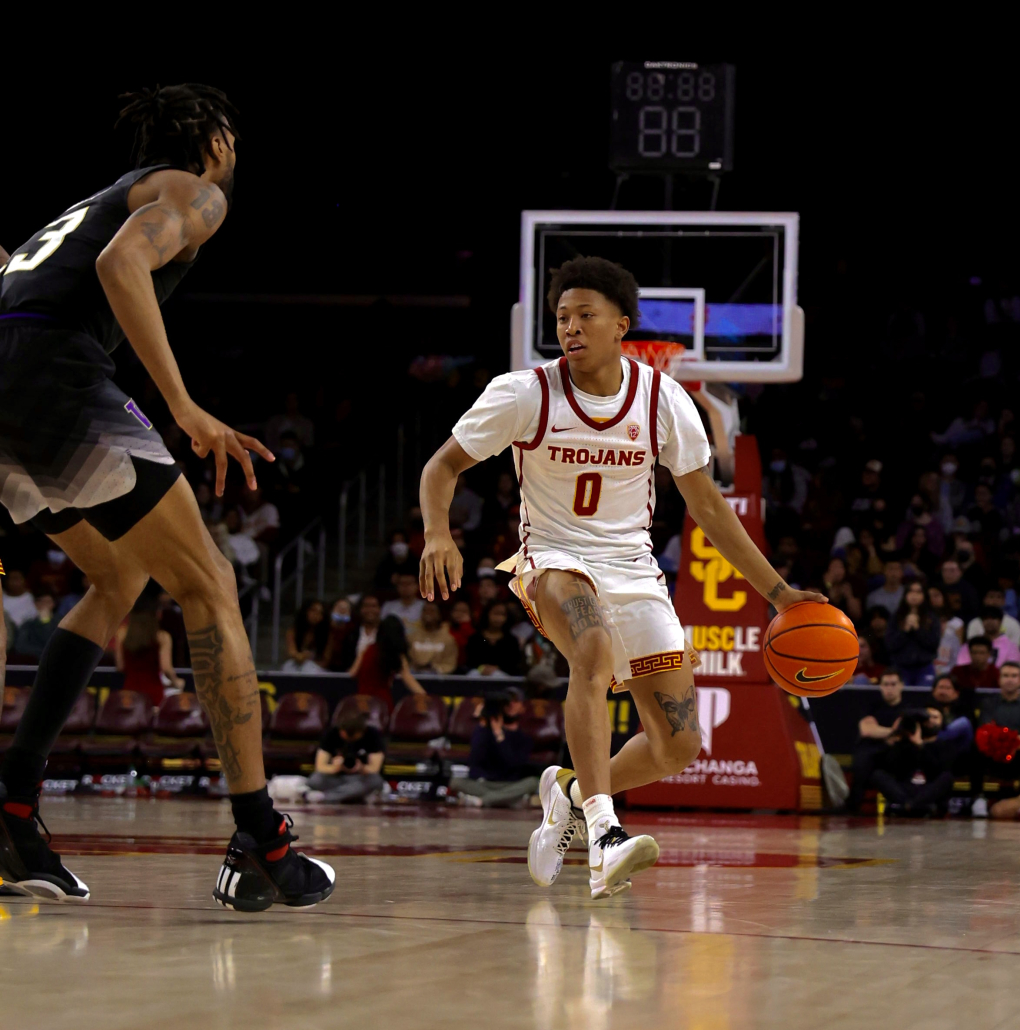 Junior guard Boogie Ellis dribbles the ball during USC's game against Washington on Feb. 17.