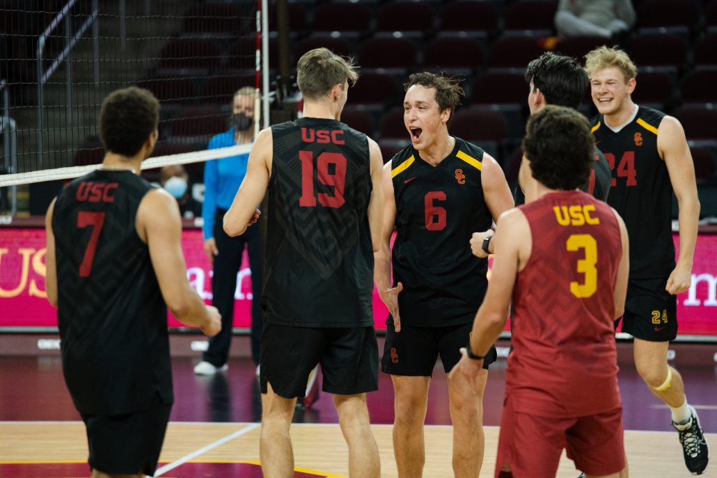 The Trojans celebrate after a point during their match against UC Irvine on Jan. 26.