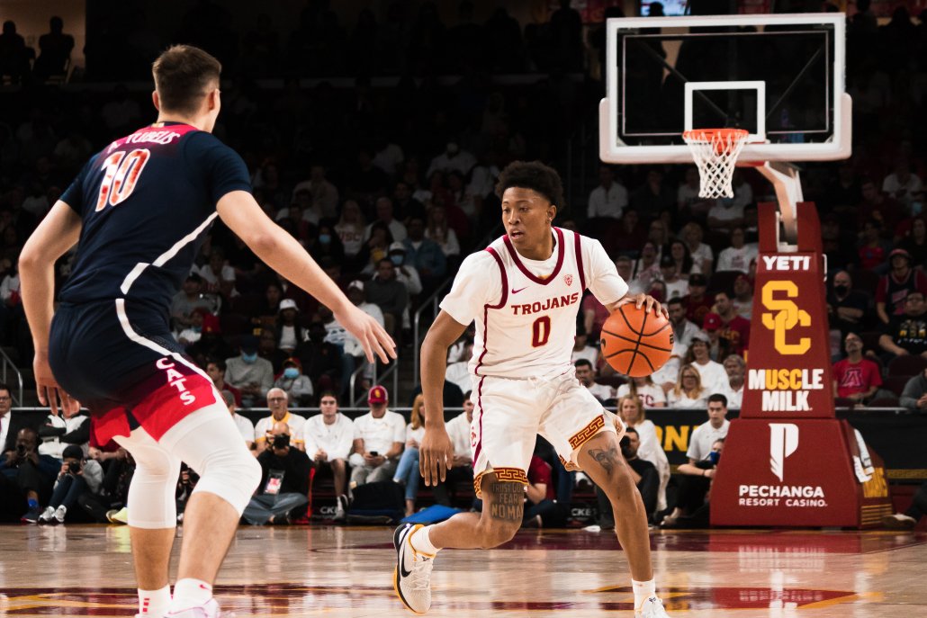 Junior guard Boogie Ellis dribbles the ball on the perimeter during USC's loss against Arizona Tuesday.