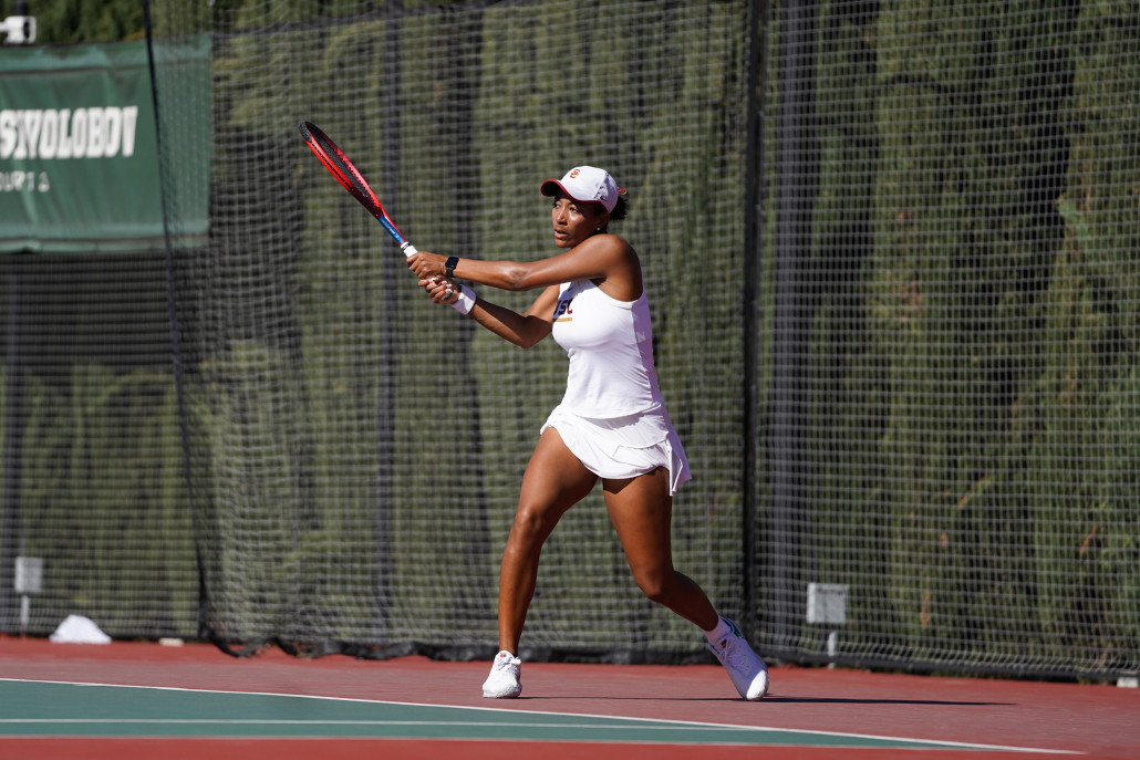 Senior Salma Ewing hits a back hand during USC’s match against St. Mary’s Jan. 23. 