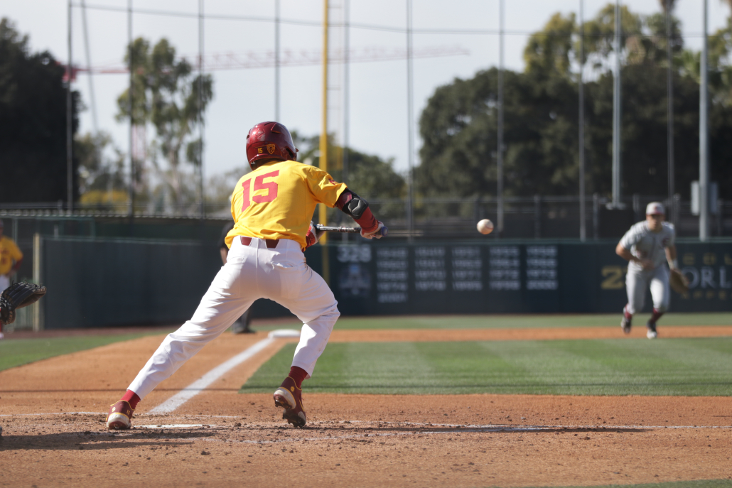 Redshirt sophomore outfielder Rhylan Thomas attempts to lay down a bunt.