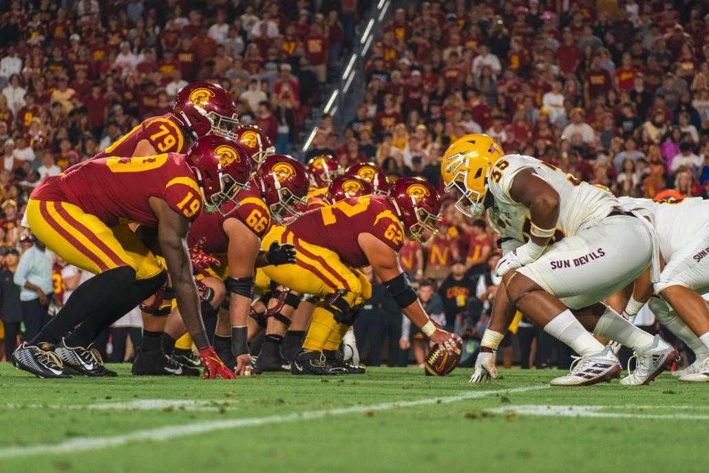 USC's offensive line prepares to block Arizona State defenders. 