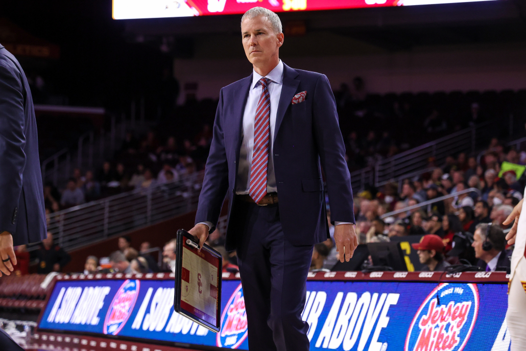 Basketball Head Coach Andy Enfield stands on the sidelines during a USC home game.
