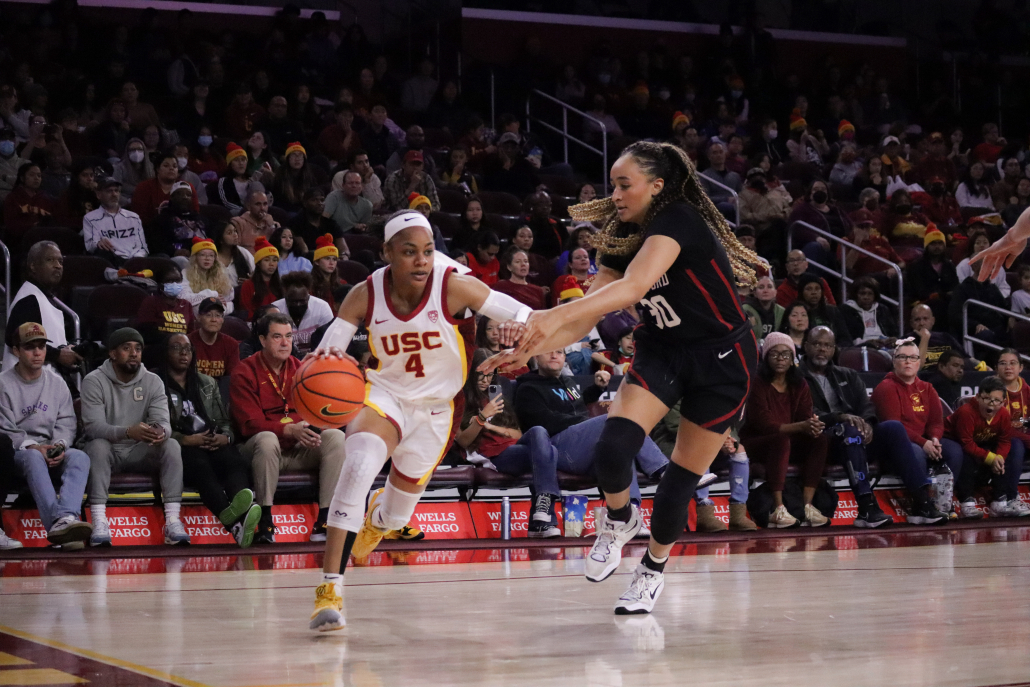Kayla Williams dribbles past a Stanford defender.