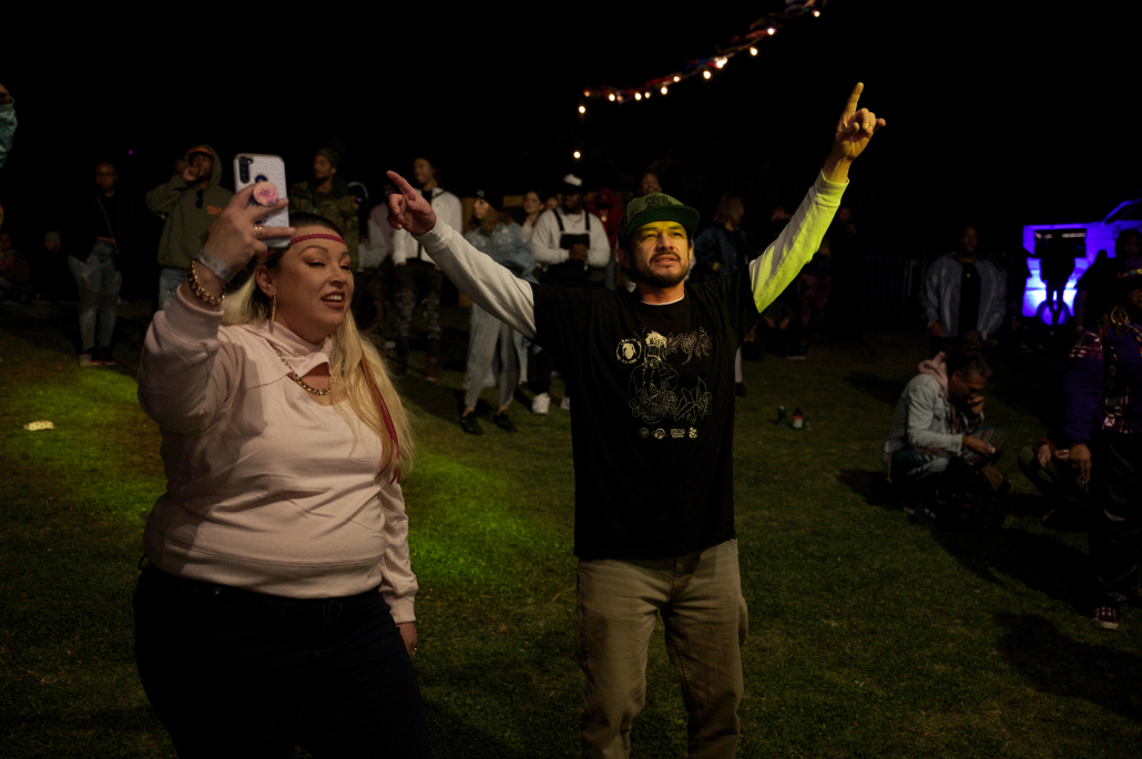 Fans dance on the lawn in front of the Boomyard stage.