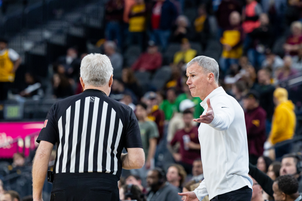 Head Coach Andy Enfield talking to one of the referees. 