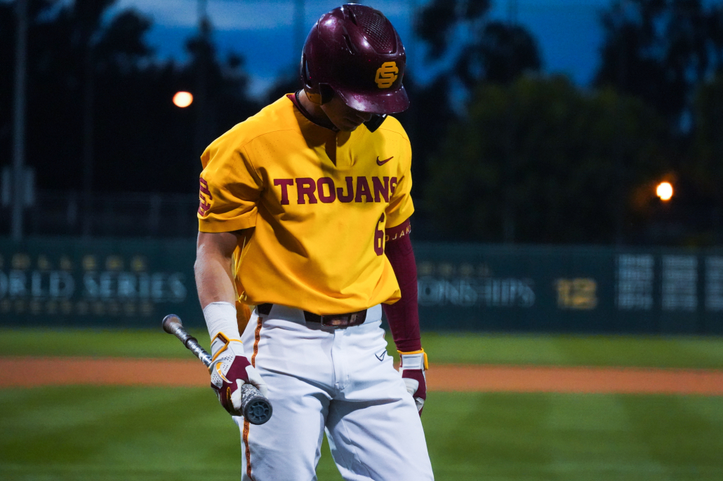 USC baseball player holding bat.