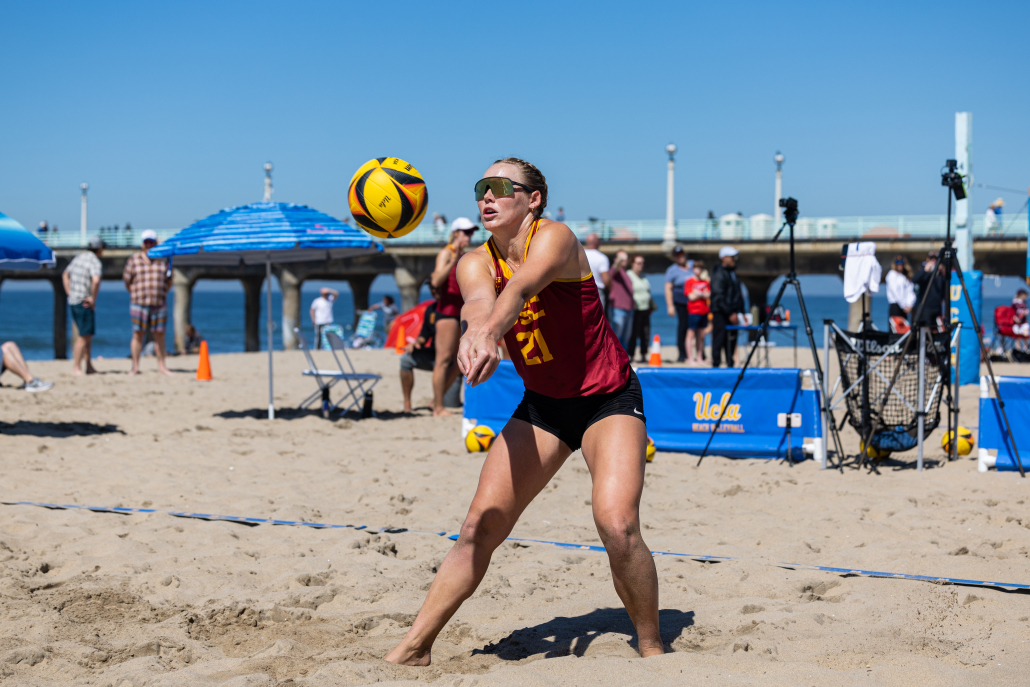 USC player digs her feet in the sand preparing for a dig.