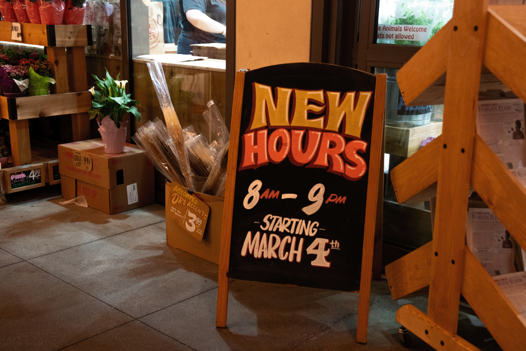 Sign displays updated Trader Joe's hours