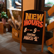 Sign displays updated Trader Joe's hours