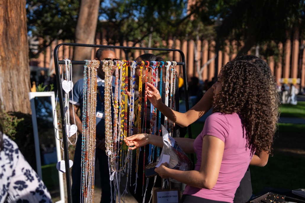 Vendors selling waist beads at the event.