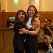 Mikaela Bautista and Emma Fallon embracing after they were announced as the winners of the election.