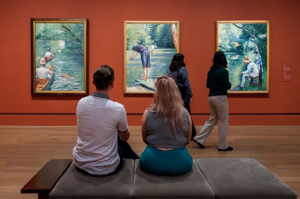 Visitors attending the "Gustave Caillebotte: Painting Men" exhibition at the Getty