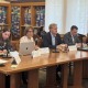 From left to right: Professor Rima Jubran, President Carol Folt, Provost Andrew Guzman, and Professor Clifford Neuman sit at a table. Folt is speaking and carries her mic in her hand.