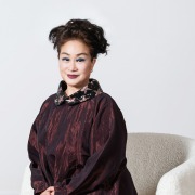 Miky Lee posing for a photo.