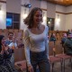 Students applaud the announcement of another cabinet member in the Forum.