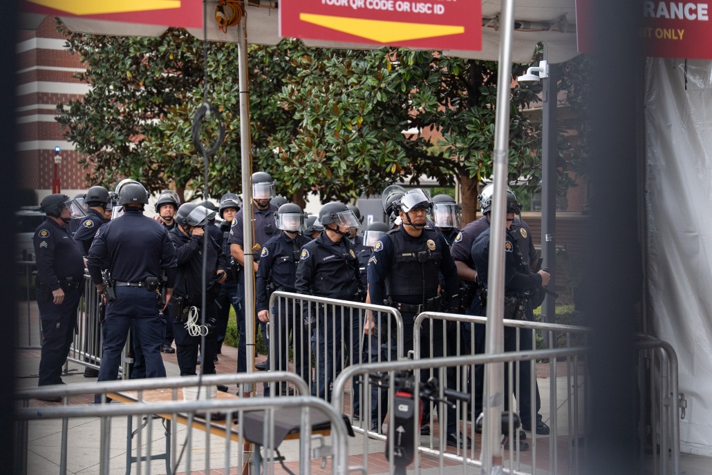 Department of Public Safety officers in rally gear outside of Trousdale North.