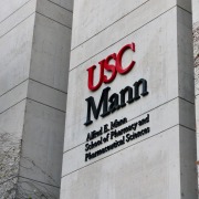 The outside of the Mann School of Pharmacy and Pharmaceutical Sciences building at Health Sciences Campus.