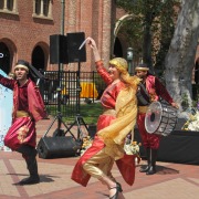 Dancers from Famous Stage perform at Hanh Plaza with lively music for the Arab American Heritage Month celebration.