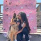 Divya Cowgill and Athena, a rescue dog.