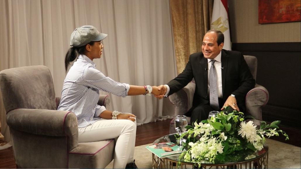 Zuriel reaches out to shake the hand of President Abdel Fattah El Sisi.