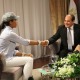 Zuriel reaches out to shake the hand of President Abdel Fattah El Sisi.