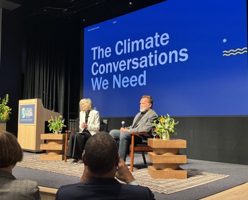 Former California Gov. Arnold Schwarzenegger and Annenberg School of Communication and Journalism Dean Willow Bay speaking at the event.