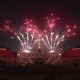 Fireworks explode above the Los Angeles Memorial Coliseum during USC's 142nd Commencement Ceremony.