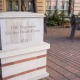 A plaque outside Engemann Student Health Center at University Park Campus.