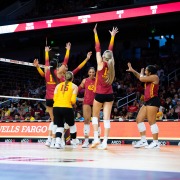 Members of the 2024 women's volleyball team celebrate.