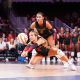 Redshirt sophomore outside hitter London Vijay and senior libero Megan Verbiest are pictured in a 2024 game.