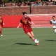 Sophomore midfielder Ines Derrien dribbles the ball during a game against California Baptist University.