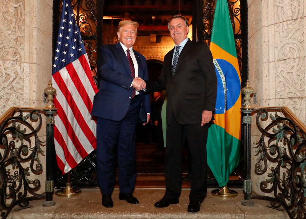 President Donald Trump meeting and shaking hands with former President of Brazil Jair Bolsonaro, taken March 7 2020.