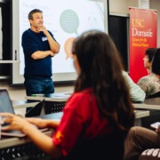 Joe Bubman presents in front of students at the "Should Hate Speech Be Free Speech?" event in Los Angeles, Calif., Wednesday, Oct. 15, 2025. (Ethan Thai / Daily Trojan)