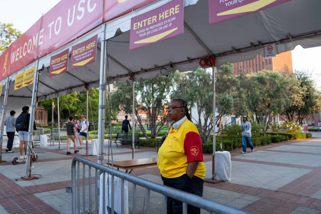 Security ambassadors at campus entrances (Mallory Snyder / Daily Trojan) USC security standing at the campus entrance.