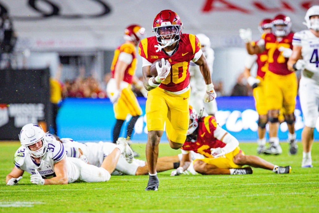 Redshirt freshman running back King Miller rushes in a game against Northwestern.