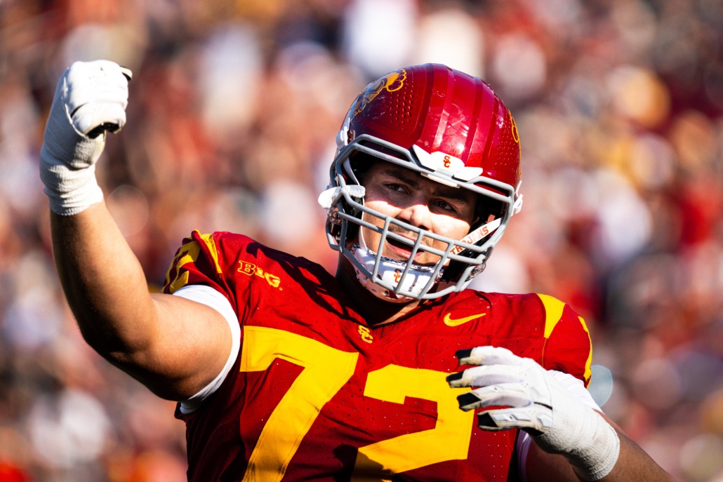 Redshirt sophomore left tackle Elijah Paige pumps his fist at an Aug. 30 game.