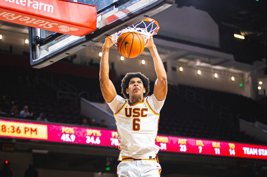 Sophomore forward Jacob Cofie dunks the ball.