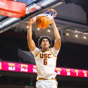Sophomore forward Jacob Cofie dunks the ball.