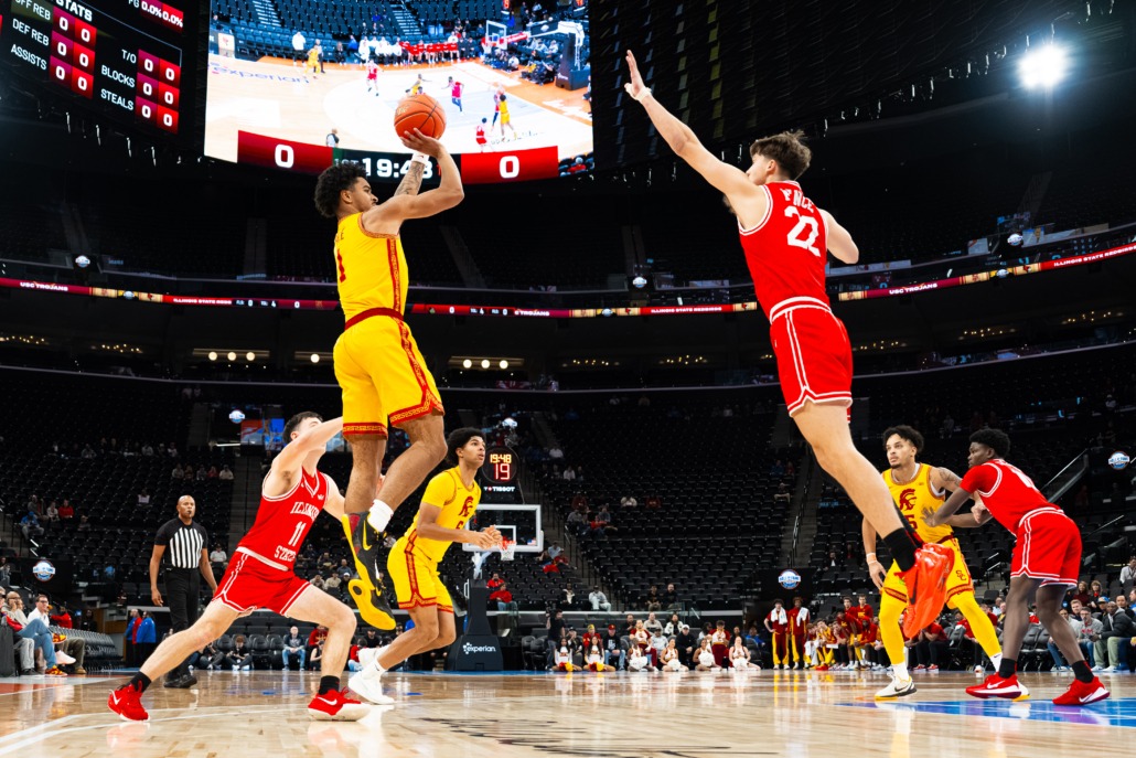 Junior guard Rodney Rice hits a contested jumper against an Illinois State defender.