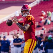 Jayden Maiava prepares to pass the ball.