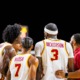 The Trojans huddle together at a November game.