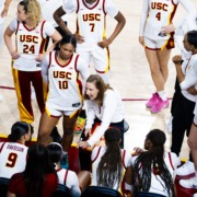 USC women's basketball huddles during a timeout